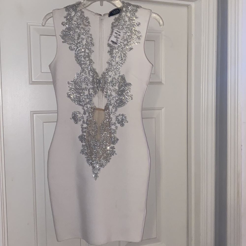 Size small mini white and silver dress never worn